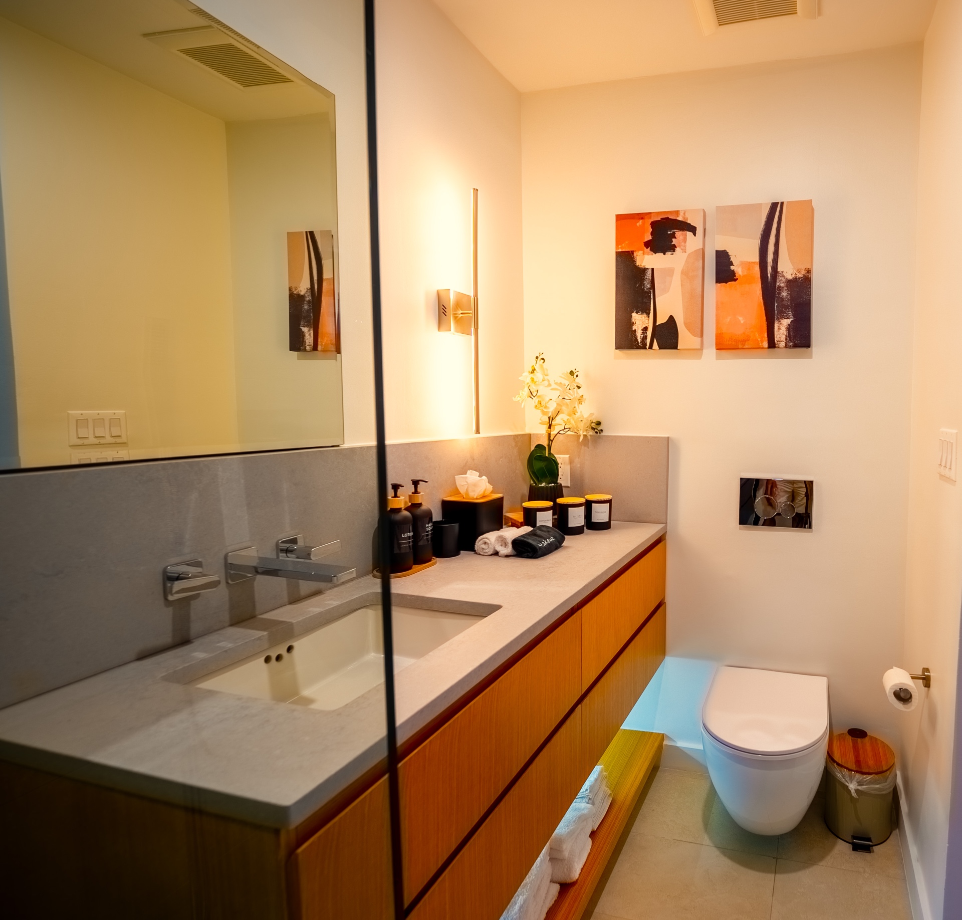 Modern guest bathroom with curated styling